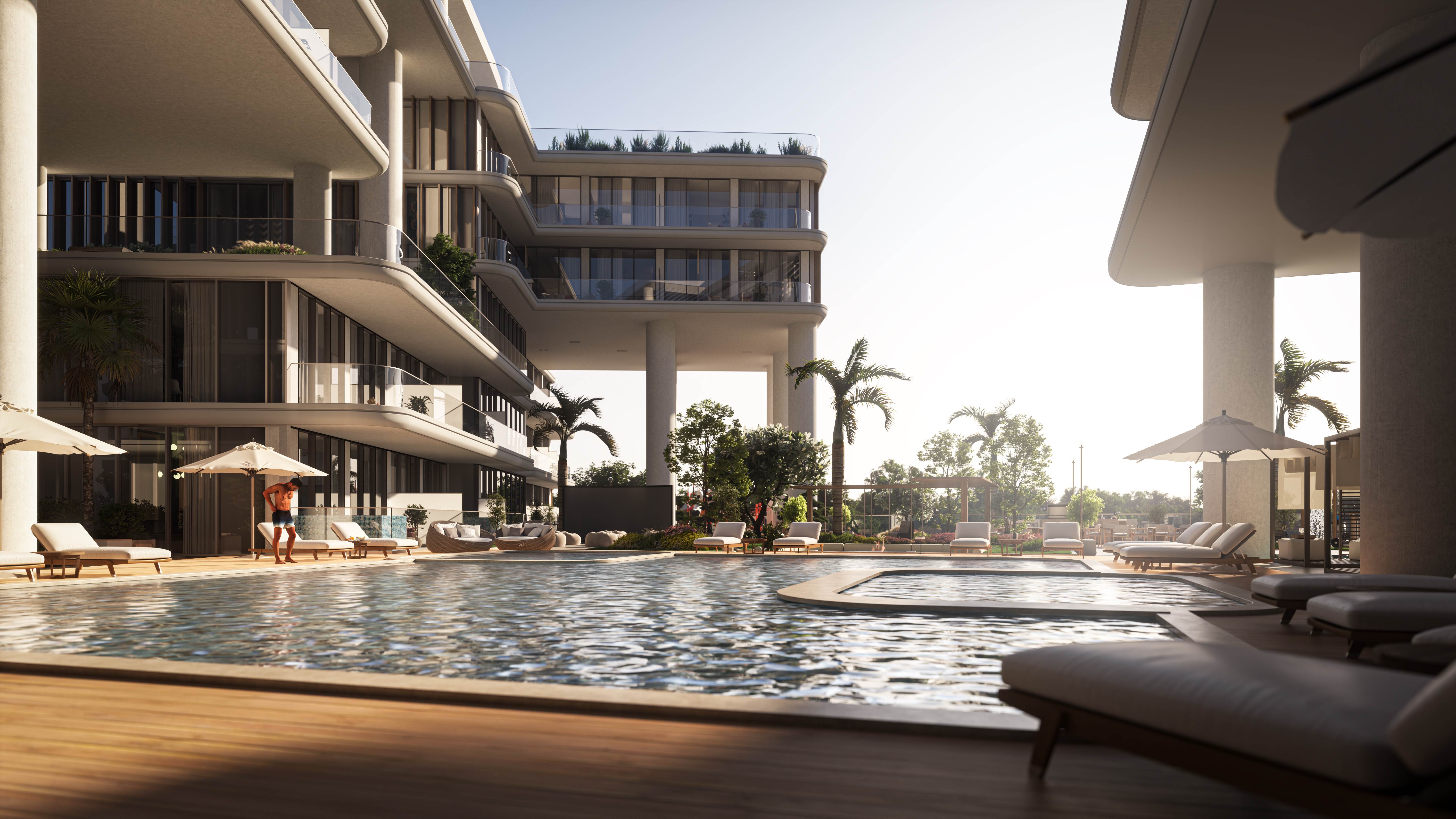 Infinity pool deck with luxury lounge chairs