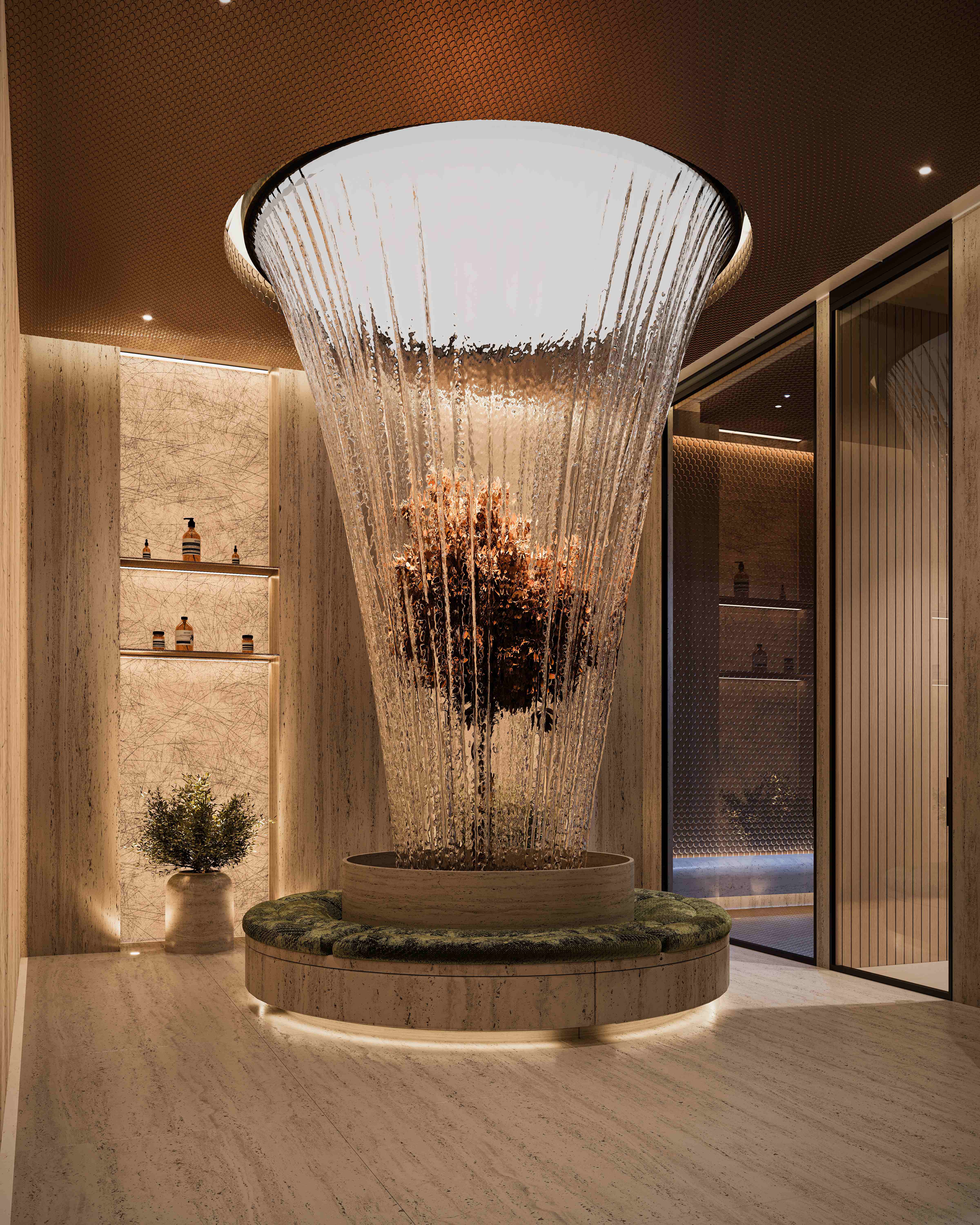 Dramatic spa entrance with circular water feature cascading from ceiling